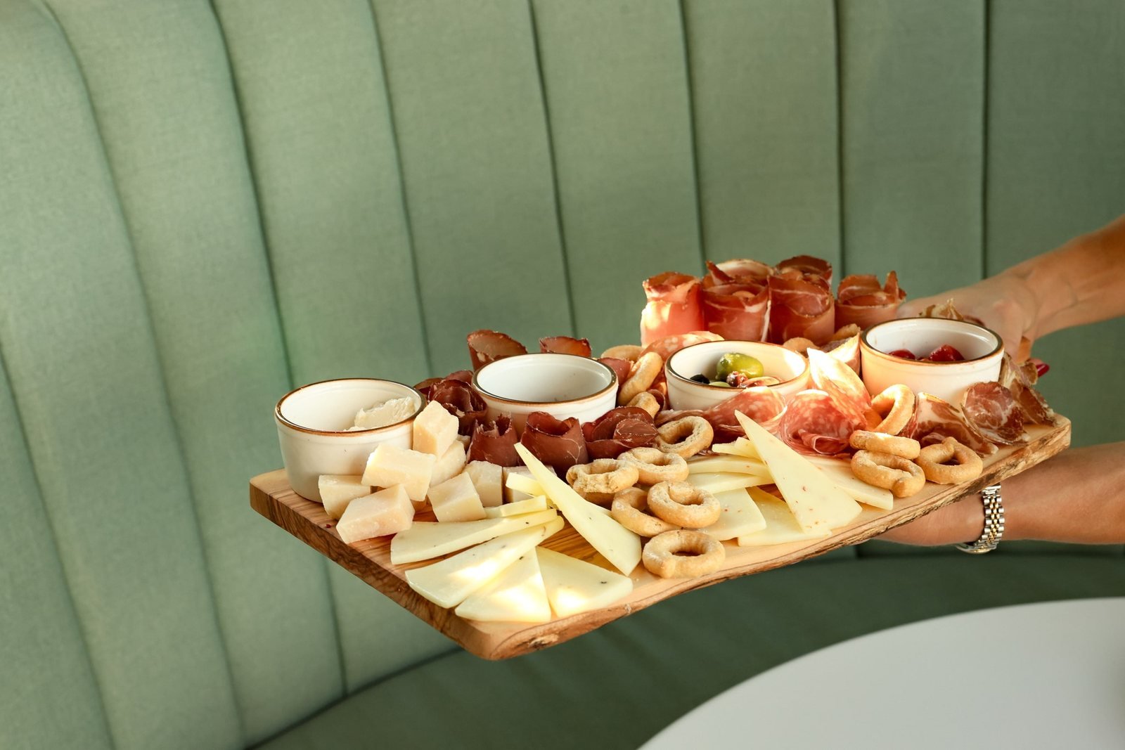 A charcuterie board and wine at the ST Arcadia wine bar
